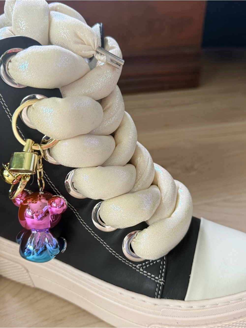 Designer-Inspired Cream Braided Lace-Up Sneaker with Iridescent Charm